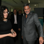 George Clooney is shown UWC Dilijan by recipient of the Amal Clooney Scholarship