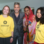 George Clooney meets Aurora Prize volunteers