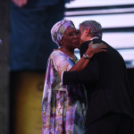 George Clooney congratulates the inaugural Aurora Prize Laureate Marguerite Barankitse