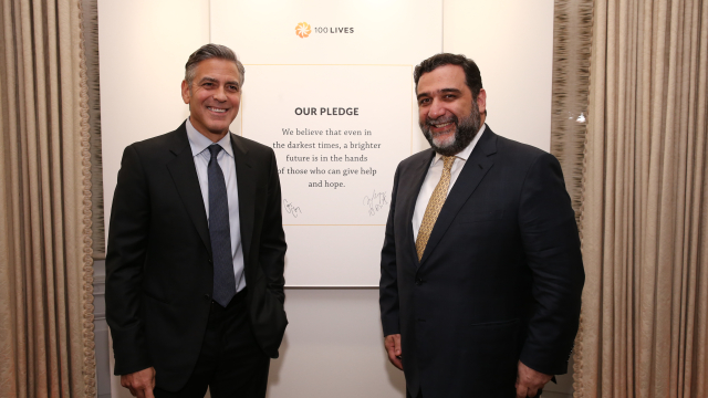 George Clooney Ruben Vardanyan at pledge wall