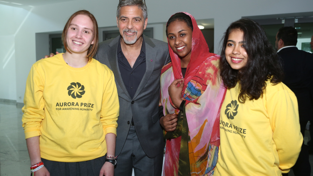 George Clooney meets Aurora Prize volunteers